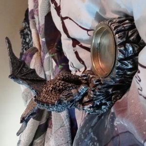 Solid putter dragon novelty candle holder..